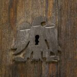 door with keyhole to a speakeasy bar