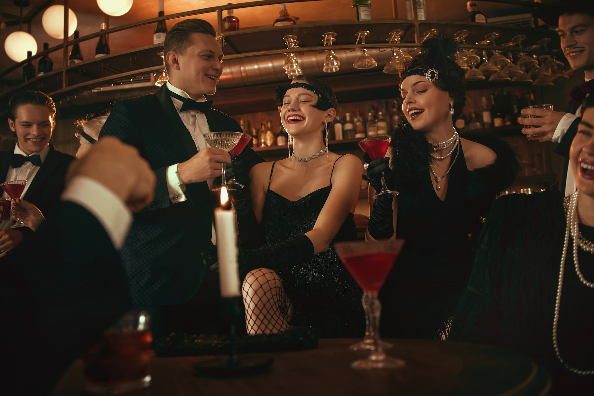 Guests enjoying cocktails at a 1920s speakeasy inside 1923 Prohibition Bar, one of the most unique party rooms for rent in Las Vegas.
